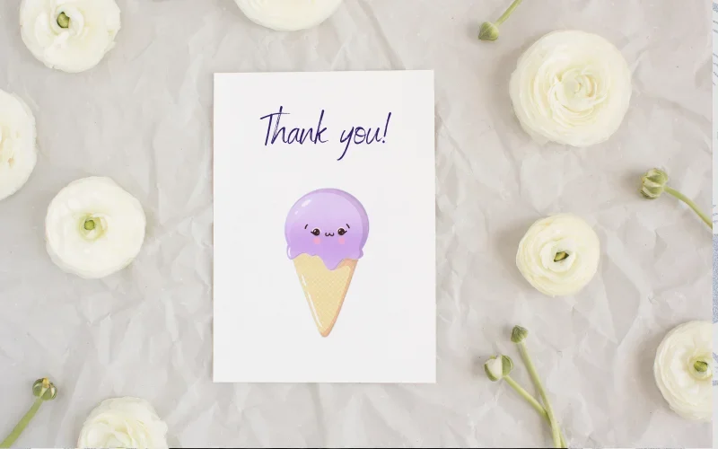 A preview of a one of the purple popsicles printed on a thank you card